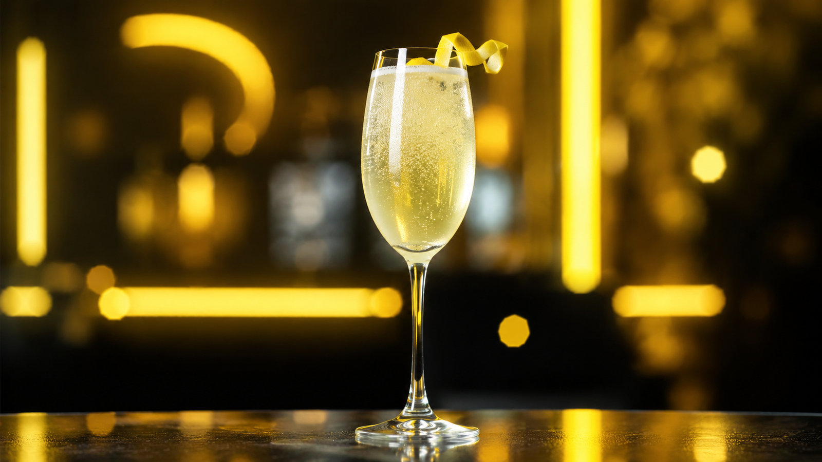 Neon Rezeptbild 232447 French 75 French 75 vor extrem unscharfem Neonhintergrund in der Farbe des Drinks